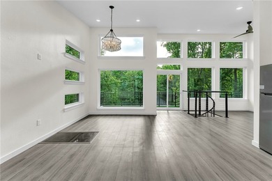 Experience modern lakeside living in Springdale with this newly - photo 4