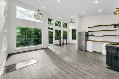 Experience modern lakeside living in Springdale with this newly - photo 9