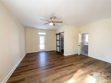 Welcome to 405 Isle Of Pines Rd, a home that exudes comfort and - photo 4