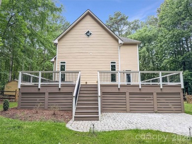 Welcome to 405 Isle Of Pines Rd, a home that exudes comfort and - photo 5