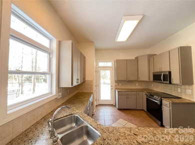 Welcome to 405 Isle Of Pines Rd, a home that exudes comfort and - photo 8