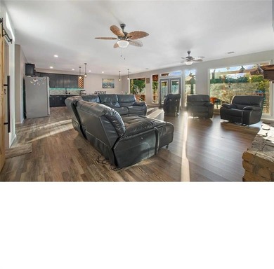 WATERFRONT SHORT-TERM RENTAL OR PRIVATE RESIDENCE. This inviting - photo 3