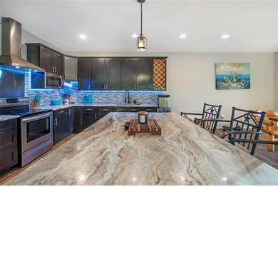 WATERFRONT SHORT-TERM RENTAL OR PRIVATE RESIDENCE. This inviting - photo 7
