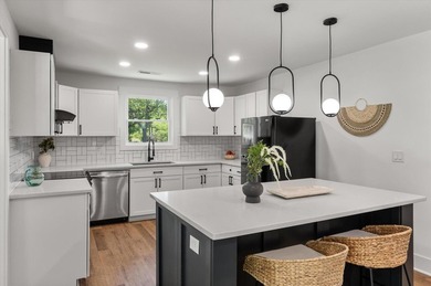 This stunning 4 bedroom, 2 bath home is located in the highly - photo 13