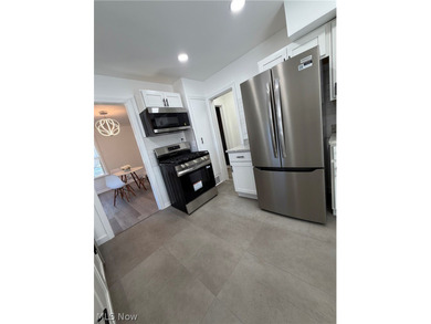 Welcome home to this stunning, fully renovated Euclid gem, where - photo 16