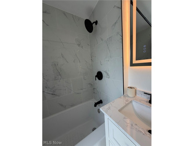 Welcome home to this stunning, fully renovated Euclid gem, where - photo 24