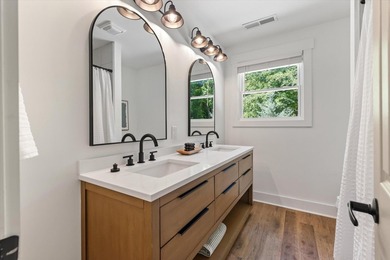 This stunning 4 bedroom, 2 bath home is located in the highly - photo 25