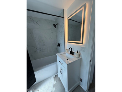 Welcome home to this stunning, fully renovated Euclid gem, where - photo 26