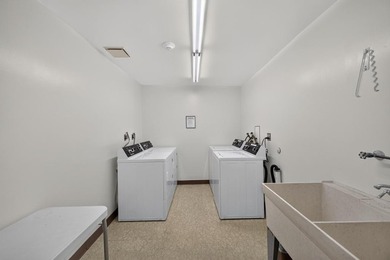 Perfectly situated in the sought-after Five Oaks building, this - photo 31