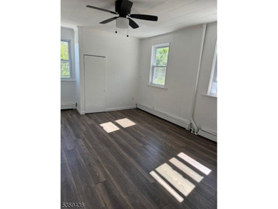 2 family home plus a room used for storage. Great rents! Newer - photo 11