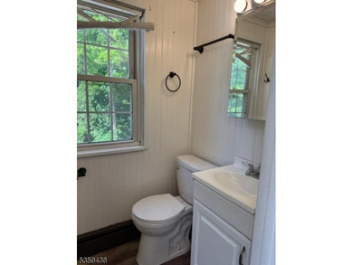 2 family home plus a room used for storage. Great rents! Newer - photo 13