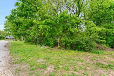 Nestled near beautiful Beaver Lake, this 0.27-acre lot presents - photo 5