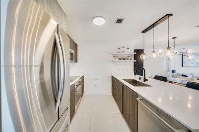 Enjoy expansive open bay views from the 48th floor at Aria on