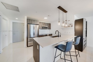 Enjoy expansive open bay views from the 48th floor at Aria on