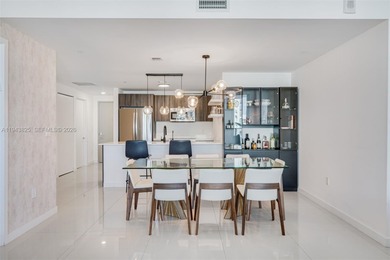 Enjoy expansive open bay views from the 48th floor at Aria on