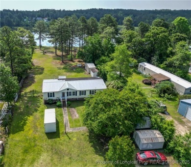 Lake Home For Sale in Cameron, North Carolina