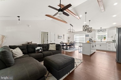 Tucked away on just under an acre of privacy, this beautifully - photo 3
