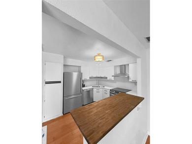 A rare corner unit with no shared walls, offering privacy and - photo 10