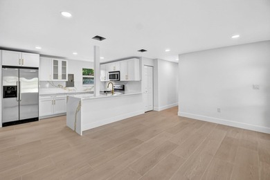 Welcome to this beautifully renovated home in Seminole Manor - photo 9