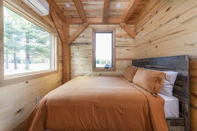 Set on approximately 213 acres of scenic lakes and mature timber - photo 11