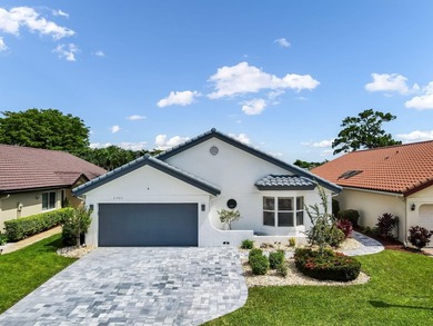 Welcome to Boca Woods Country Club. Exceptional updated home - photo 1