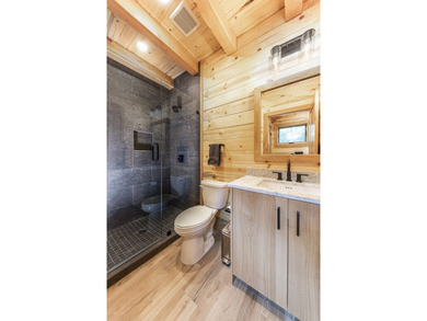 Set on approximately 213 acres of scenic lakes and mature timber - photo 12