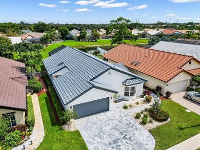 Welcome to Boca Woods Country Club. Exceptional updated home - photo 2