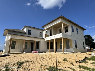 Rare opportunity to own a custom-built waterfront home in the - photo 3