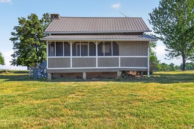 Nestled in the rolling hills of Tennessee, this historic cabin - photo 5