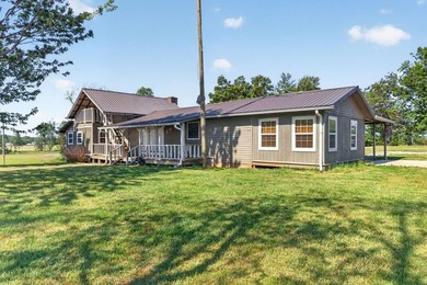 Nestled in the rolling hills of Tennessee, this historic cabin - photo 6