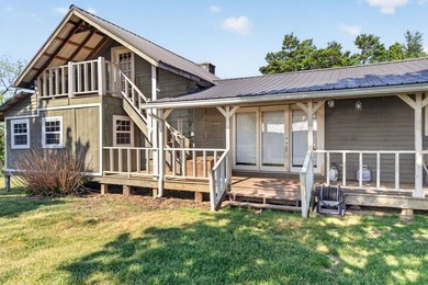 Nestled in the rolling hills of Tennessee, this historic cabin - photo 7