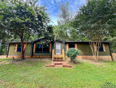 Come fall in love with this pristine 3 bedroom, 2 bath 1680 sq - Lake Home For Sale in Jefferson, Texas