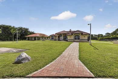 This lovely house sits on 5 aces in the tranquil equestrian - photo 3