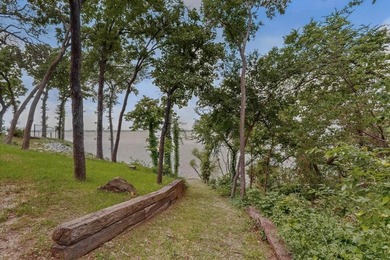 Welcome to this stunning Lake Lewisville Lakefront Estate, where - photo 35