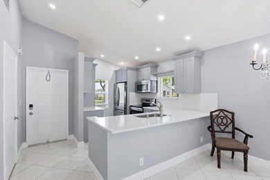 Nice 2/2 Corner Unit Villa w/ a new roof and has a 1 Car garage - photo 5