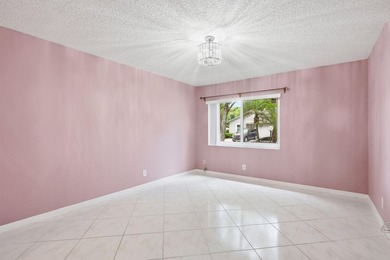 Nice 2/2 Corner Unit Villa w/ a new roof and has a 1 Car garage - photo 9