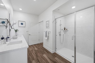 Welcome to 5933 Sunstone Dr #410, a modern luxury condo with 2