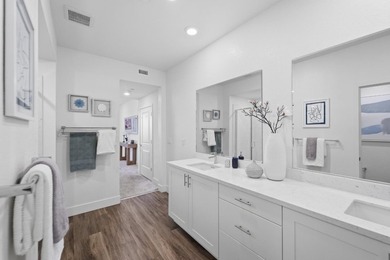 Welcome to 5933 Sunstone Dr #410, a modern luxury condo with 2