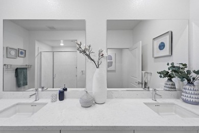 Welcome to 5933 Sunstone Dr #410, a modern luxury condo with 2