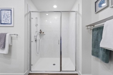 Welcome to 5933 Sunstone Dr #410, a modern luxury condo with 2