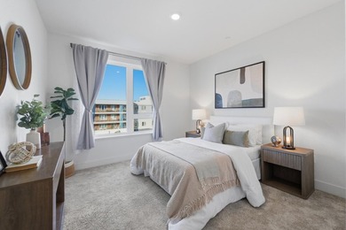 Welcome to 5933 Sunstone Dr #410, a modern luxury condo with 2