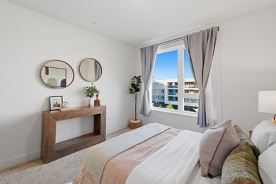 Welcome to 5933 Sunstone Dr #410, a modern luxury condo with 2