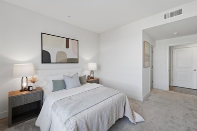 Welcome to 5933 Sunstone Dr #410, a modern luxury condo with 2