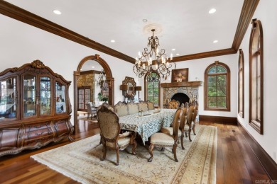 Tucked inside the gated Valley Falls Estates, this custom home