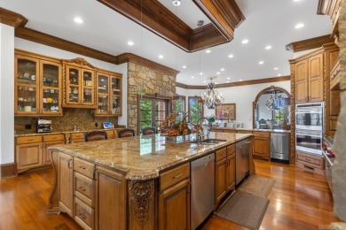 Tucked inside the gated Valley Falls Estates, this custom home