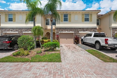 Welcome to this charming 3-bedroom, 2.5-bathroom townhouse - photo 2