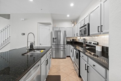 Welcome to this charming 3-bedroom, 2.5-bathroom townhouse - photo 7