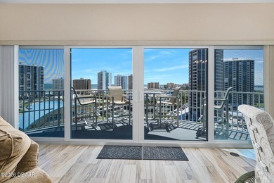 Experience the height of coastal luxury in this 10th-floor