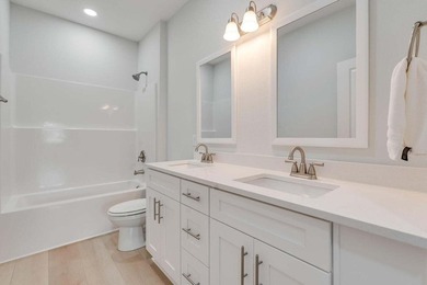 Experience the pinnacle of coastal living in the newly completed - photo 17