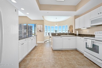 Experience the height of coastal luxury in this 10th-floor